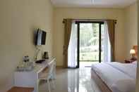 ห้องนอน Coban Rondo Palawi Resort