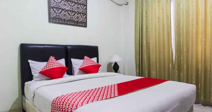 Kamar Tidur Super OYO 1682 Greenia Hotel