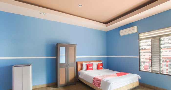 ห้องนอน OYO 1685 Garuda Guest House