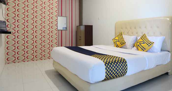 Bedroom SPOT ON 1772 Hotel Penginapan Cemara Syariah