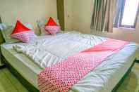 Bedroom OYO 3871 Hotel Surya