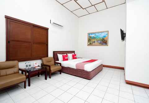 Bedroom SUPER OYO Capital O 1644 Hotel Griya Kencana 