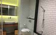 In-room Bathroom 4 Nagomi Suites & Hotel
