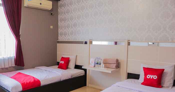 Kamar Tidur OYO 1710 Hotel Budi Famili 2 Syariah