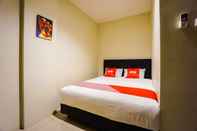 Kamar Tidur SUPER OYO 1769 Rid's Hotel