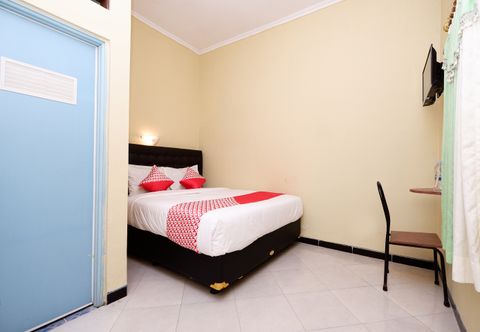 卧室 OYO 1791 Griya Boytown