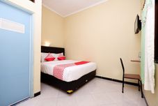 卧室 OYO 1791 Griya Boytown