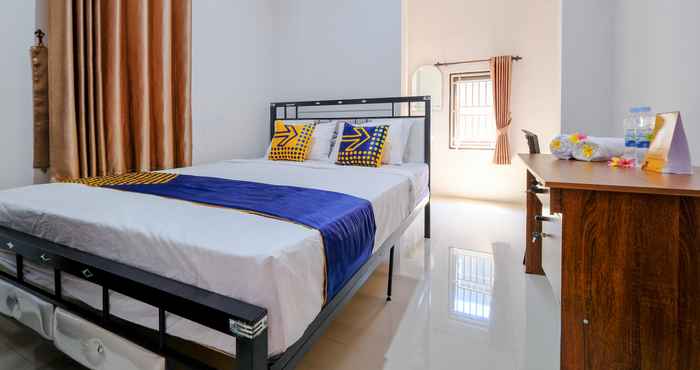 Kamar Tidur SPOT ON 1784 TNC Residence Syariah