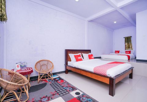 Bedroom OYO 1834 Family Homestay Syariah