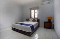 Kamar Tidur SPOT ON 1792 Roemah Nenekoe Guest House