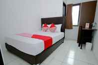 ห้องนอน Super OYO 1678 Jati Exclusive Homestay