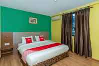 Phòng ngủ Capital O 89538 Ocean Hotel