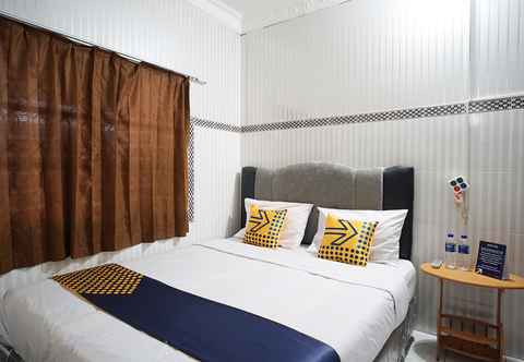 Bedroom OYO 1854 Sepinggan Asri Syariah Guesthouse