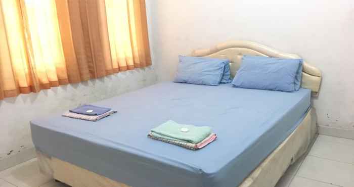 Bedroom OYO 1601 Anugrah Hotel