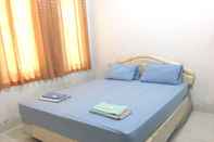 Bedroom OYO 1601 Anugrah Hotel