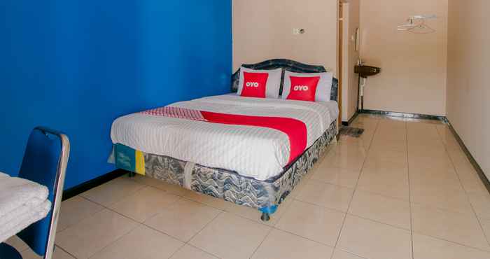 Kamar Tidur OYO 1866 Amazon Homestay Syariah