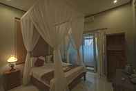 ห้องนอน Aura Bisma Guesthouse