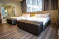 Bedroom Gold Orchid Premier Hotel
