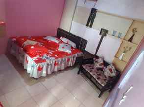 Kamar Tidur 4 Room at Darmo Homestay