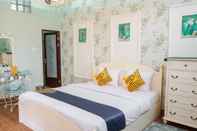 Bedroom SPOT ON 2053 Granada Syariah Home Stay