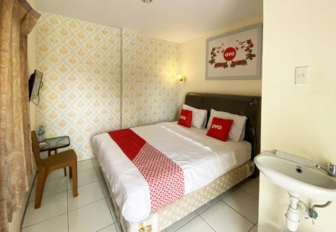 Bedroom OYO 1634 Dom Residence