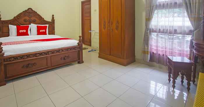 ห้องนอน OYO 1804 Guest House Oema'h Opa