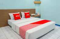 Bedroom OYO 2088 Grha Blue Sky Syariah