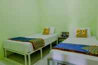 ห้องนอน SPOT ON 2081 Sriwijaya Family Residence