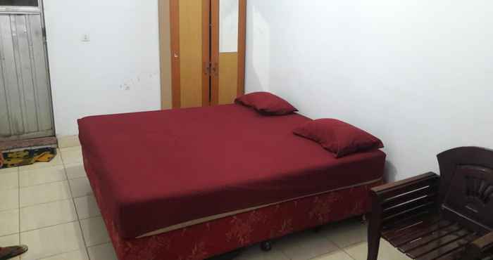 ห้องนอน Hotel Fauziah Syariah