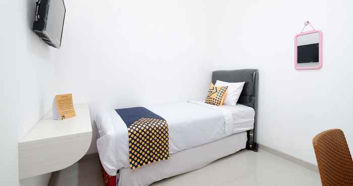 Bedroom SPOT ON 2026 Arta Residence