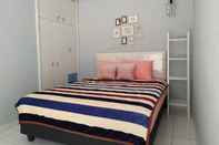 Bedroom SPOT ON 2040 House of Peach Syariah Near RSUP Hasan Sadikin