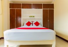 침실 6 J & H Apartments
