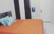 ห้องนอน 6 Apartemen Kalibatacity By Herdi