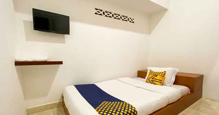 Kamar Tidur SPOT ON 2051 Sho Family Homestay & Resto