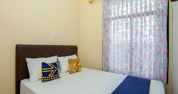 Kamar Tidur SPOT ON 2076 Hotel Stadion