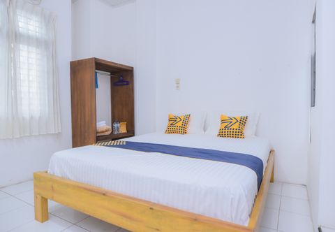 침실 OYO 2134 Seunia Hotel