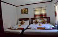 Kamar Tidur 5 Thatsaphone Hotel