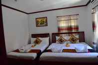 Bedroom Thatsaphone Hotel