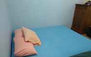 Kamar Tidur 4 Moelya Homestay