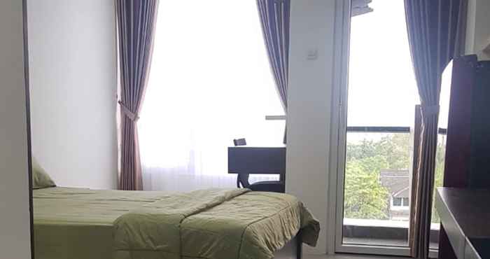 Bangunan Studio Room at Dio Green Park Apartment