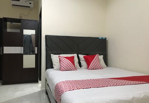 침실 Toar House Manado