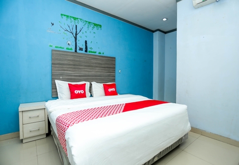 Bedroom OYO 2197 Pulau Laut Guest House