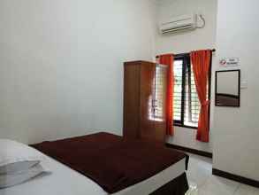 Kamar Tidur 4 Mbah Djo's Guest House Syariah