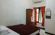 Kamar Tidur 4 Mbah Djo's Guest House Syariah