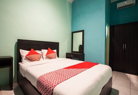 침실 Hotel O Bunga Raya Residence