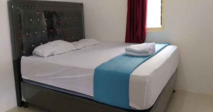 Kamar Tidur OYO 2198 Fatima Guest House Syariah