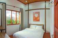 Phòng ngủ Villa Doi Gio Hu - City Garden View		