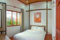 Bedroom Villa Doi Gio Hu - City Garden View		