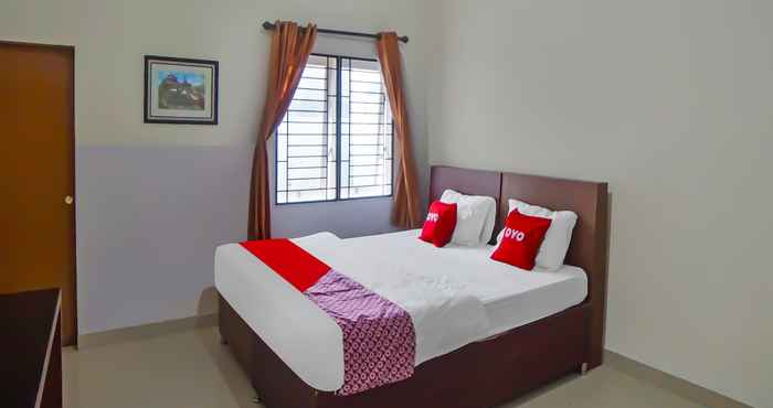 Bilik Tidur OYO 92314 De Coco Guesthouse