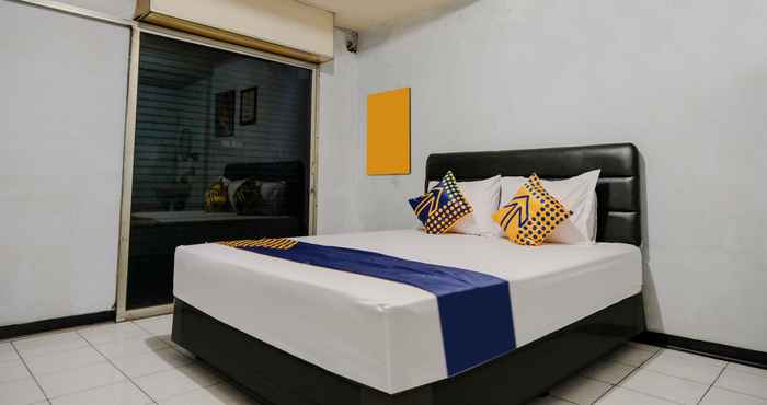 Kamar Tidur SPOT ON 2271 Nabila O Family Residence